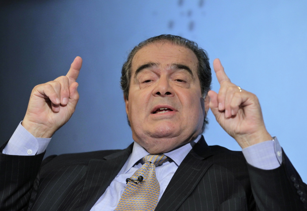 U.S. Supreme Court Justice Antonin Scalia, shown in 2012, remains opposed to the landmark New York Times v. Sullivan decision 50 years later.