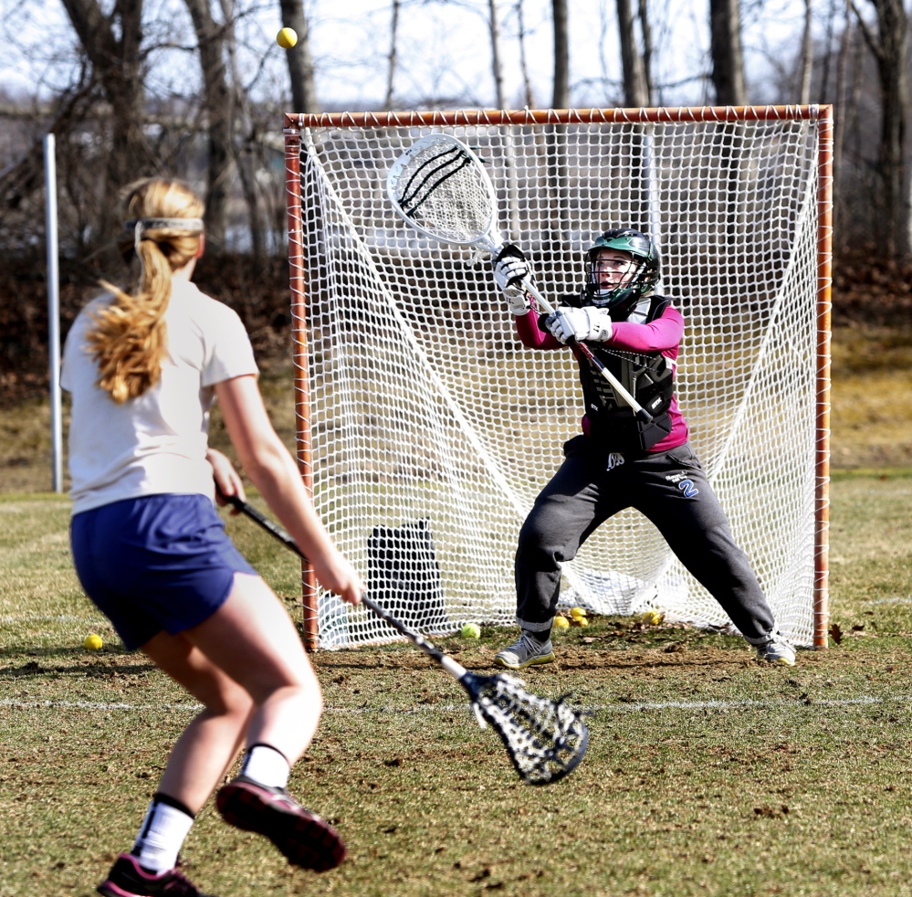 A former attacker, sophomore Charlotte Majcerik has shifted to goalie and will be counted upon to stop shots for perennial power Waynflete.