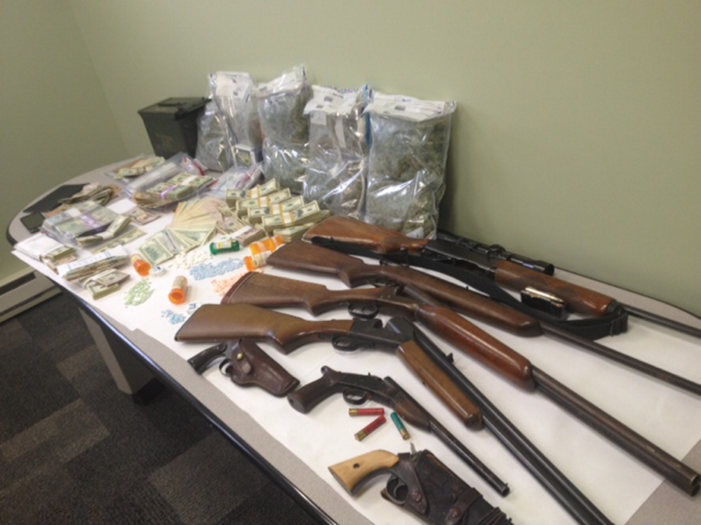 Seized in an Avon drug bust were 442 pills, seven firearms and more than $144,000 in cash.