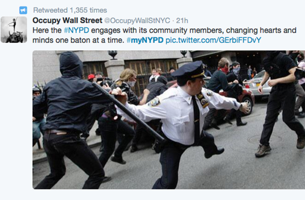 This image was posted in response to a Twitter request by the NYPD to offer up feel-good photos of people posing with police officers.