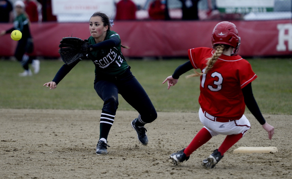 Bonny Eagle’s Breanna Lifland waits for the ball as Scarborough’s Brittany Plowman slides safely into second base for a stolen base during Wednesday’s softball game.