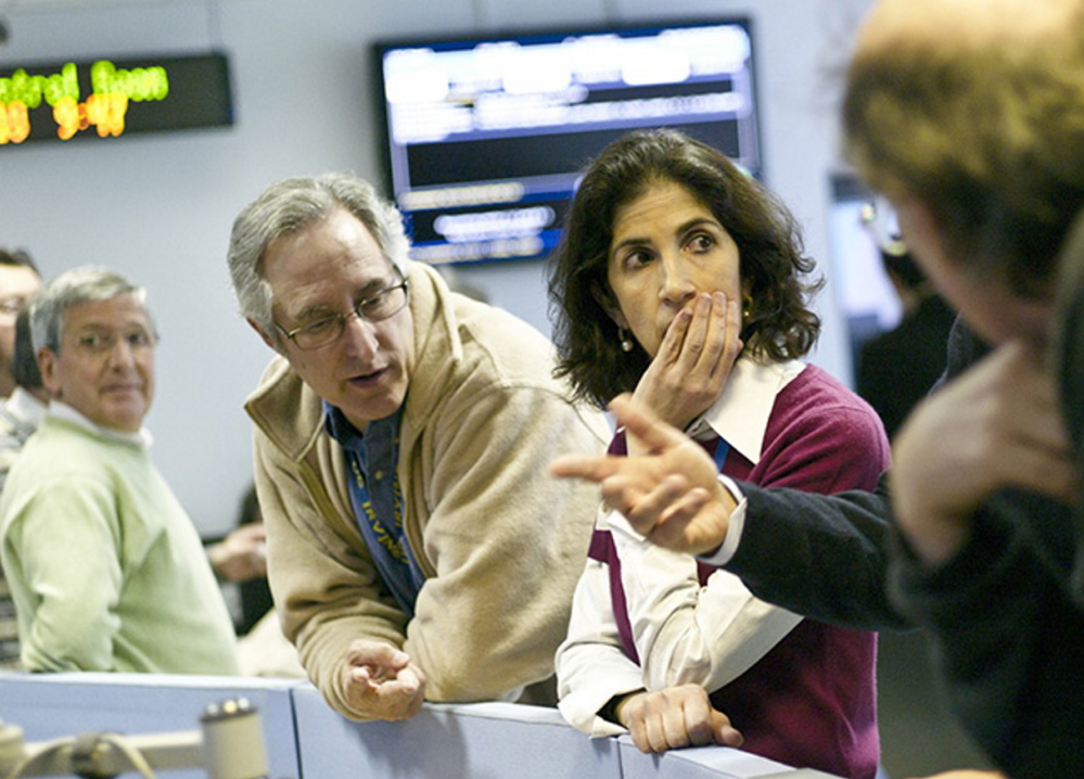 Fabiola Gianotti celebrating in the ATLAS control room, March 29, 2010, the day of First High Energy Collisions.