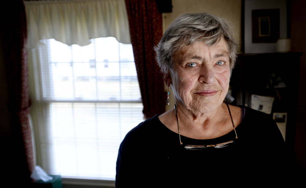 Retired nurse Nancy Johnson of Cape Elizabeth, seen in her home Thursday, expected a refund after filing her 2013 federal tax return on April 9. But it was rejected because someone had already filed a return using her Social Security number.