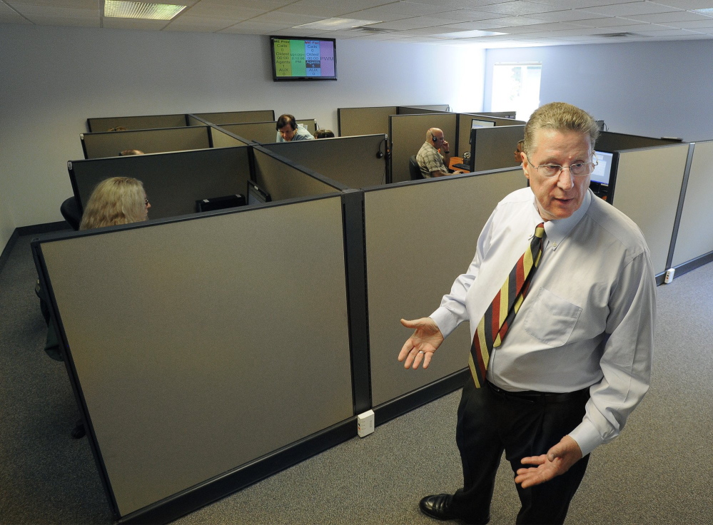 LogistiCare Vice President Bob Harrison, shown at the Kennebunk call center in 2013, says the company learned from its mistakes and will be able to expand to other regions of the state without the same problems it had last year in York County.