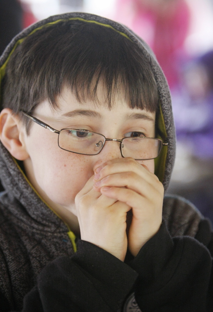 Elliot Timblin, 9, of Harpswell demonstrates his best duck call while listening to and learning about birdcalls at Bradbury Mountain State Park in Pownal on Saturday.