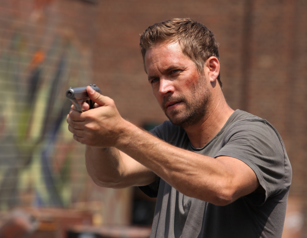 The late Paul Walker in a scene from “Brick Mansions.”