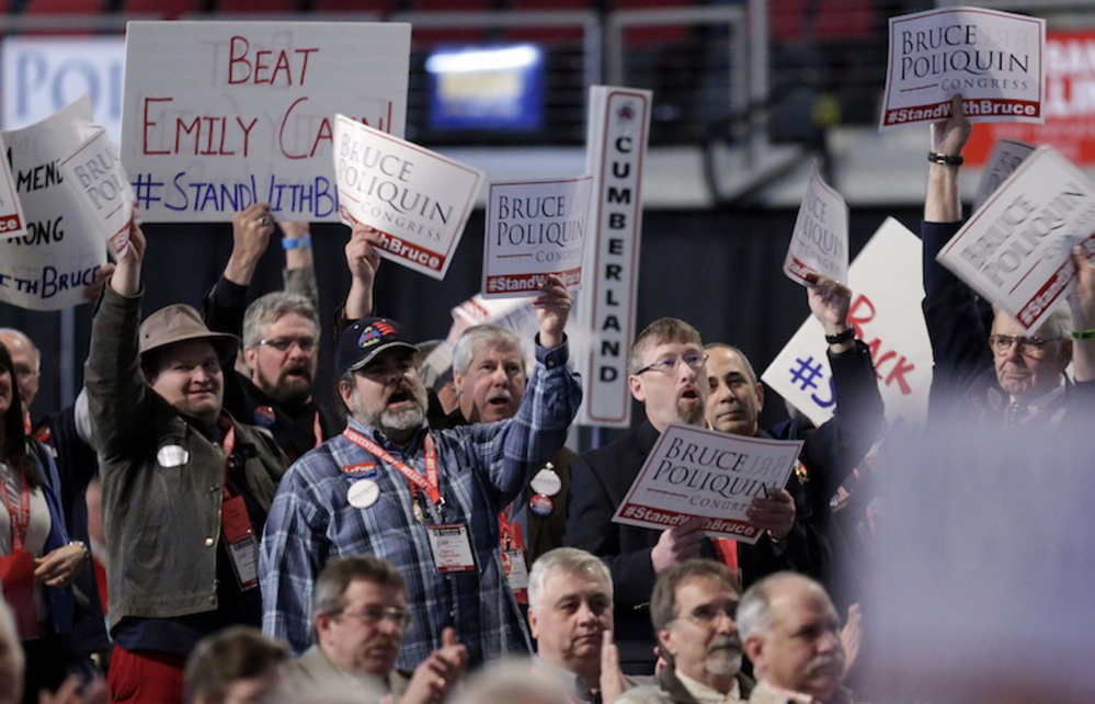 Supporters of congressional candidate Bruce Poliquin cheer at the Maine GOP Convention on Saturday.