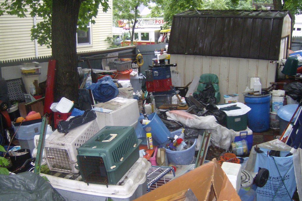 Although most hoarders keep their accumulation of stuff inside the home where it won’t embarrass them, sometimes the mess spills outside, like it did at this Portland residence in 2009.