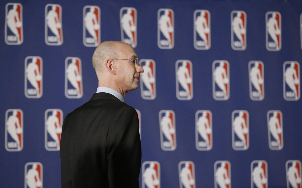 NBA Commissioner Adam Silver arrives at news conference in New York, Tuesday, April 29, 2014. Silver announced that Los Angeles Clippers owner Donald Sterling has been banned for life by the league, in response to racist comments the league says he made in a recorded conversation.