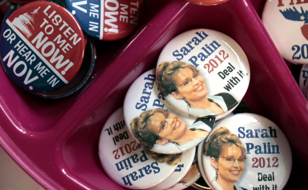 “Sarah Palin 2012” buttons at the “Americans for Prosperity” summit” in 2010