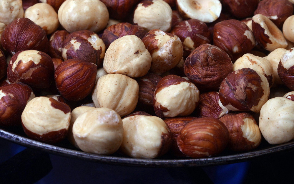 Oregon hazelnuts have become the global benchmark for large size and distinctive flavor. Here, hazelnuts toast in a pan.
