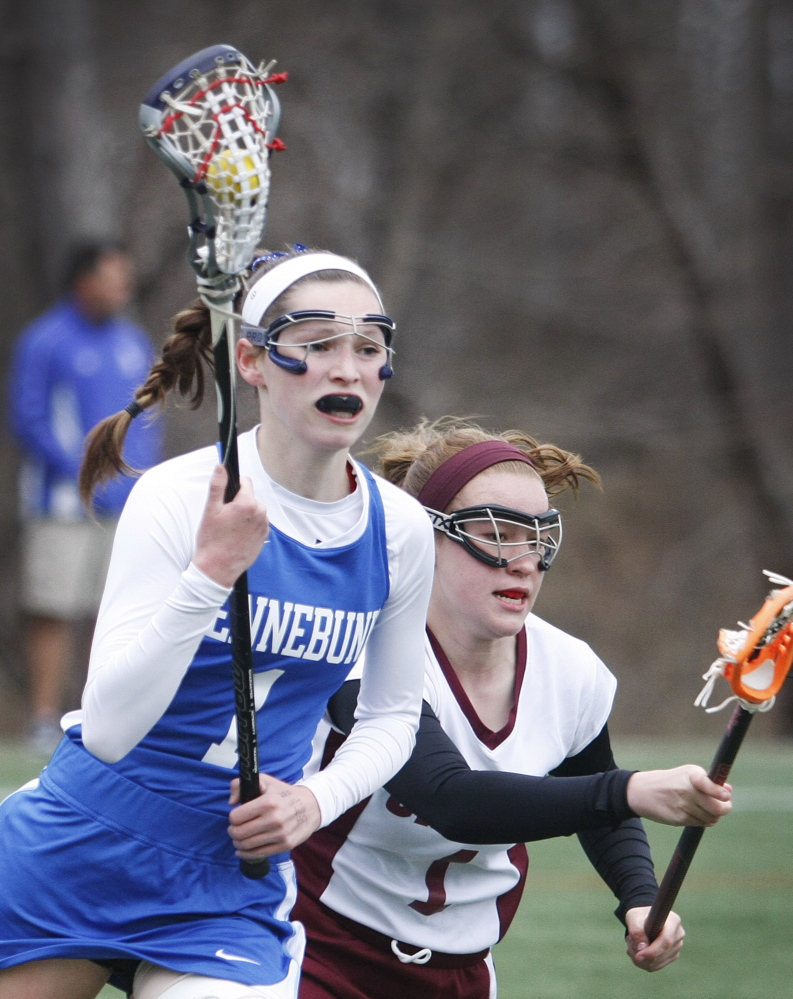 Jenny Bush, defended by Maggie Reed of Greely, played an instrumental role in Kennebunk’s 8-3 victory against the Rangers in a girls’ lacrosse game Wednesday, showing her ability to win draws.