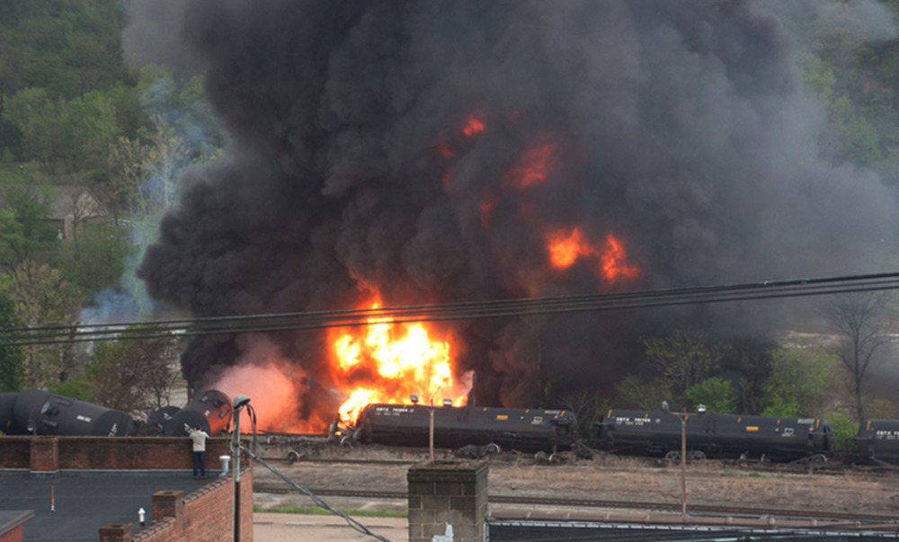Several CSX tanker cars carrying crude oil burn after derailing in downtown Lynchburg, Va., on Wednesday.