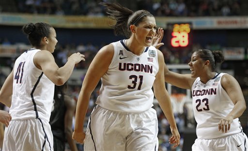 Connecticut center Stefanie Dolson celebrates during the first half of the semifinal game against Stanford in the Final Four tournament Sunday in Nashville.