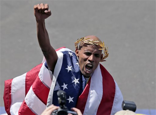 Meb Keflezighi of San Diego, Calif., celebrates his victory in the 118th Boston Marathon on Monday in Boston.