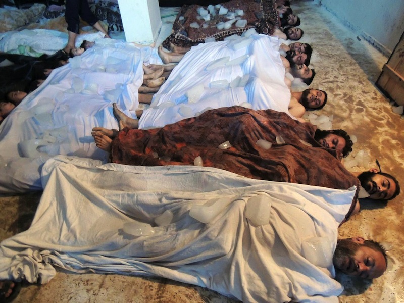 This Aug. 21, 2013, file image provided by Shaam News Network, which has been authenticated based on its contents and other AP reporting, purports to show bodies of victims of chemicals attack on Ghouta, Syria. The Britain-based Syrian Observatory for Human Rights said Tuesday that it has documented 150,344 deaths in the conflict that started in March 2011. The figure includes civilians, rebels, and members of the Syrian military. It also includes militiamen, fighting alongside President Bashar Assad’s forces and foreign fighters battling for Assad’s ouster on the rebels’ side.