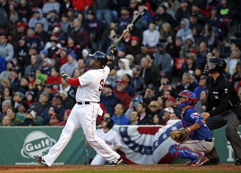 Boston's David Ortiz watches his three-run homer in front of Texas catcher Robinson Chirinos during the eighth inning at Fenway Park on Wednesday, April 9, 2014. The Red Sox won 4-2 thanks to the home run.