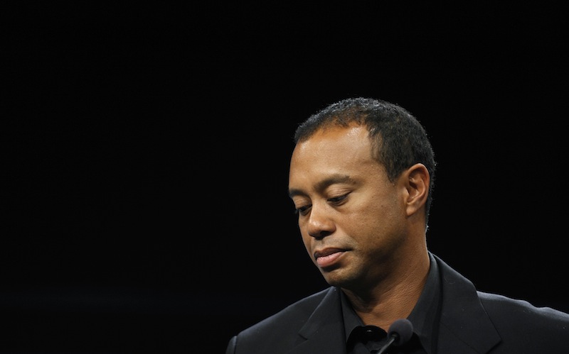 Tiger Woods, seen here last month, will miss the Masters for the first time in his career after having surgery for a pinched nerve in his back.