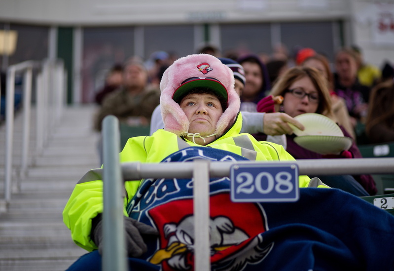 Pam Brown of Westbrook, a season ticket holder, was ready for the chilly temperatures at the season opener for the Portland Sea Dogs at Hadlock Field Thursday, April 10, 2014.