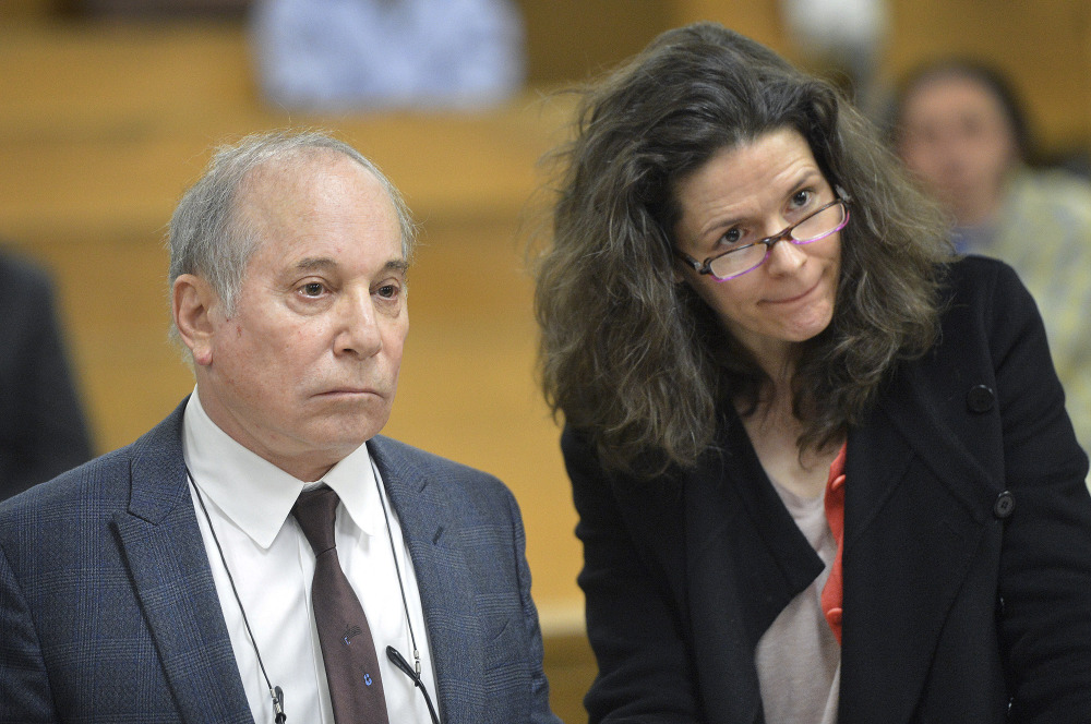 Singer Paul Simon and his wife, Edie Brickell, appear at a hearing in Norwalk Superior Court on Monday in Norwalk, Conn. Simon made the 911 call that brought police to their home, according to a police report.