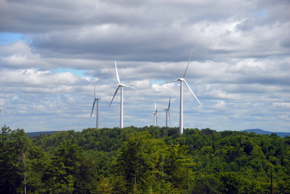 First Wind turbines spin on Stetson Mountain. The Maine Board of Environmental Protection took a preliminary step Thursday toward rejecting a wind farm in Penobscot County.