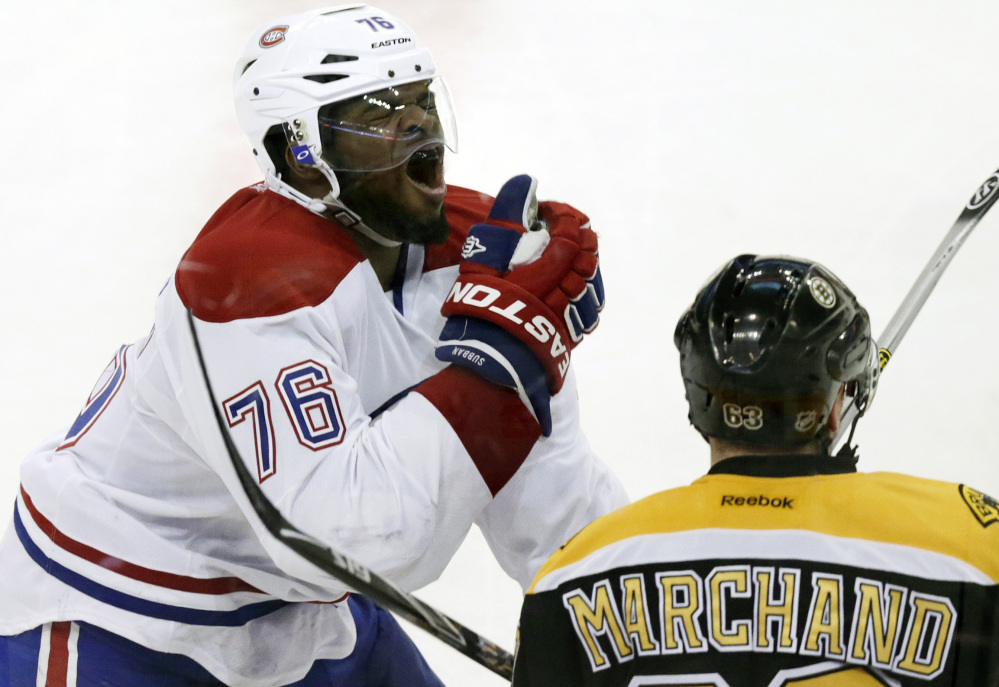 Montreal Canadiens defenseman P.K. Subban reacts after getting hit in the face by Boston Bruins left wing Brad Marchand’s stick during Game 1 of their second-round Stanley Cup playoff series Thursday.