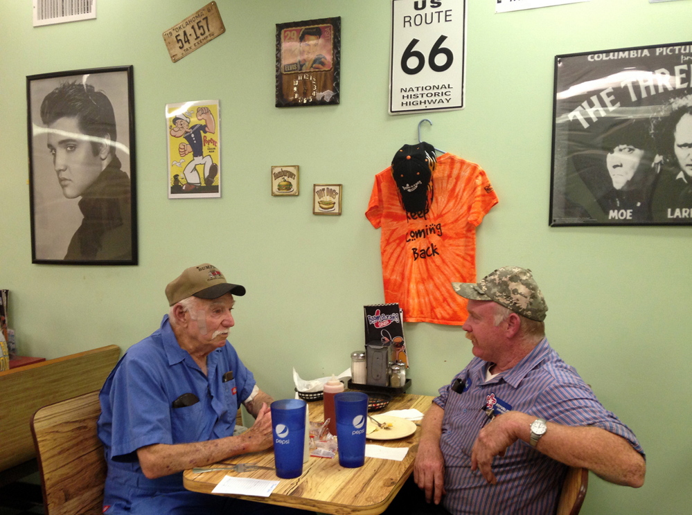 F.D. Sexton, left, says of the death penalty: “It’s like the Lord said: You reap what you sow.” At right is his son Brett Sexton Thursday at the Boomarang Diner in Checotah, Okla.