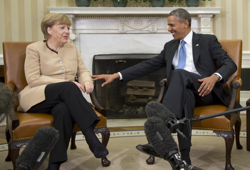 President Barack Obama meets with German Chancellor Angela Merkel in the Oval Office Friday. Merkel, like Obama, has ruled out military action to deter Vladimir Putin from seizing more of Ukraine.