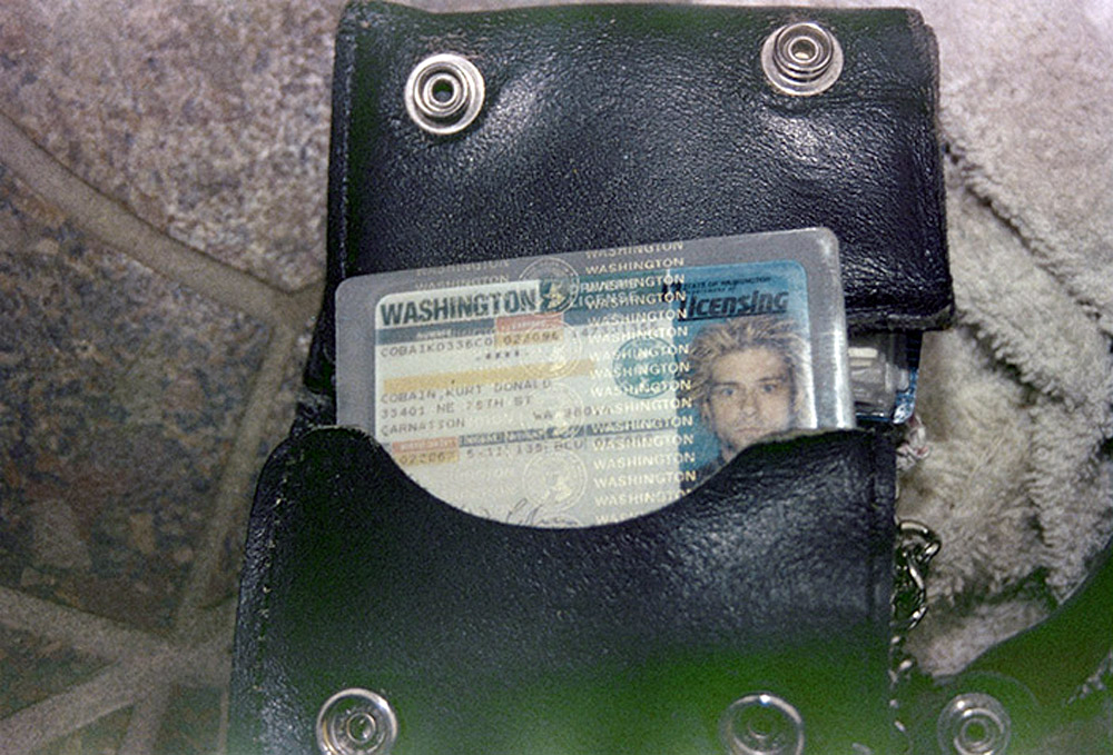 This April 1994 photo from the Seattle Police Department shows a wallet containing Kurt Cobain’s Washington state driver’s license, found at the scene of his suicide, in Seattle.