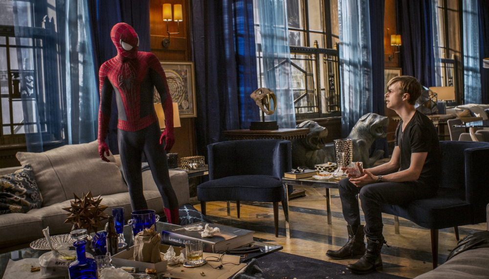 Andrew Garfield, left, and Dane DeHaan converse in a scene from “The Amazing Spider-Man 2.”
