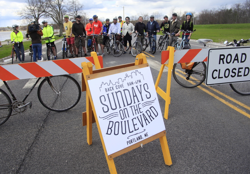 Portland city officials and members of the Portland Bicycle and Pedestrian Advisory Committee gather Sunday to kick off the Baxter Boulevard closure to vehicular traffic on Sundays.
