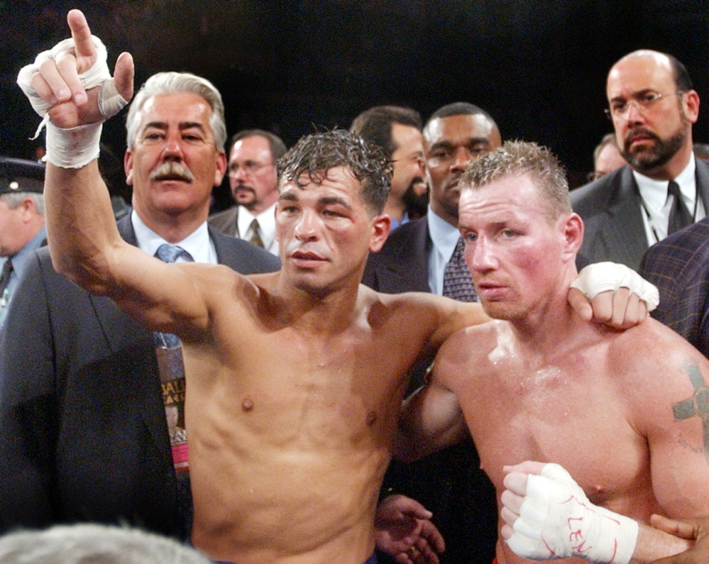 Arturo Gatti, left, and Micky Ward, fought three times, twice in 2002. The two pose after the second 2002 fight, won by Gatti by unanimous decision.