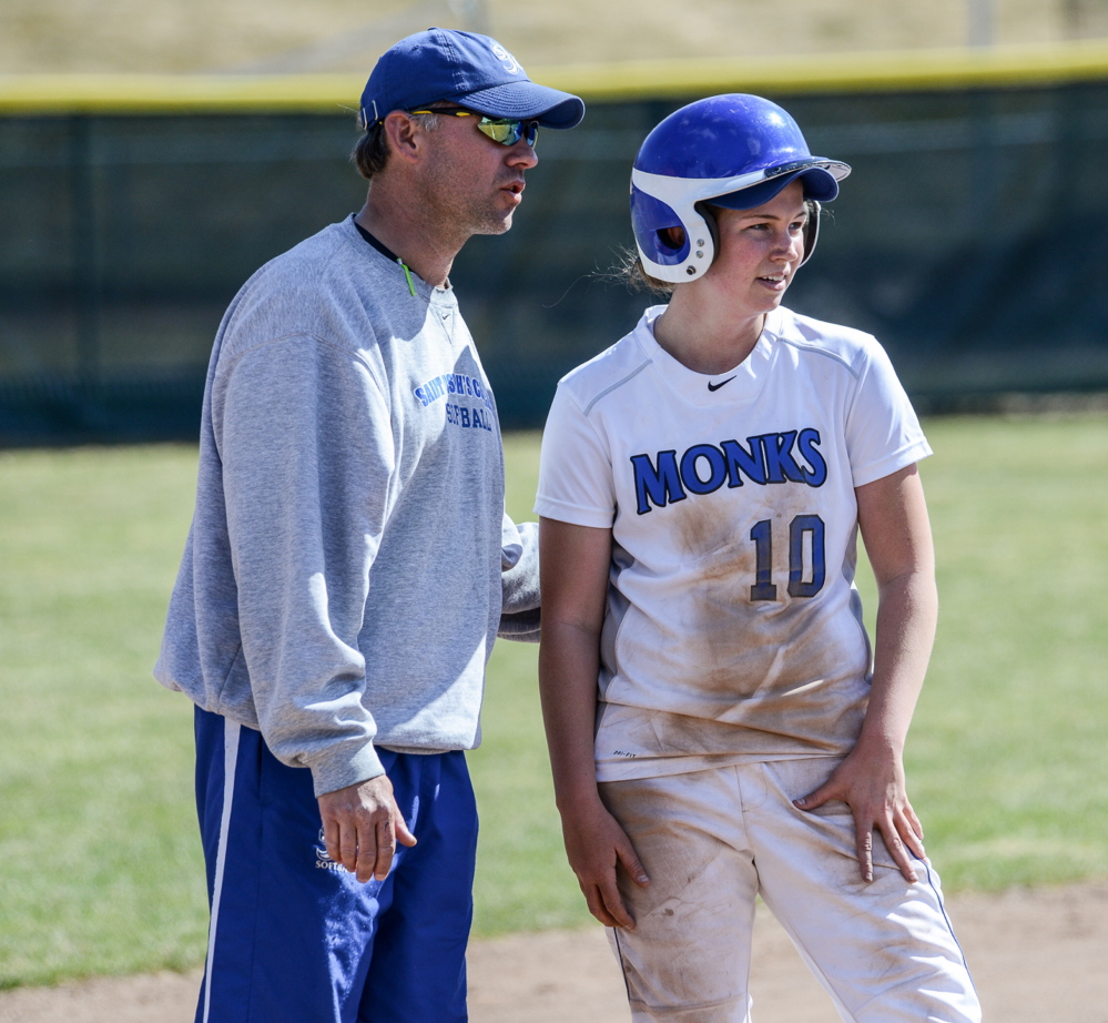 St. Joseph’s Coach Jamie Smyth offers advice to Danica Gleason, who is hitting .459 with 24 runs scored and 22 RBI as the Monks head to the NCAA Division III tournament.
