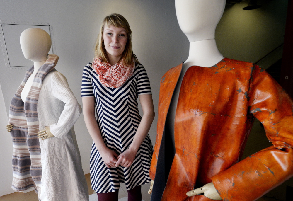 Rose Allard in the display window with some of her work at the Maine College of Art. Allard, who holds the distinction of being the first graduate of MECA’s textile and fashion design program, credits her Finnish grandmother for the inspiration behind many of her creations.