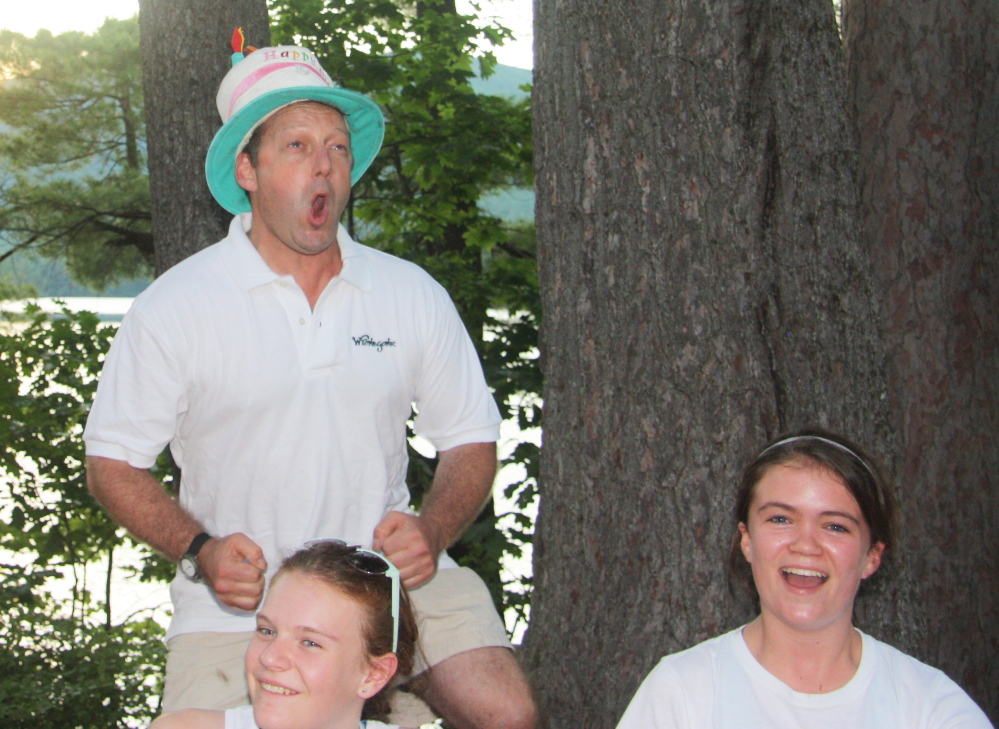 Steven Sudduth, wearing a birthday hat, is the owner of Wyonegonic Camps in Denmark – where a week or more without a cellphone is part of the “life skills” experience.