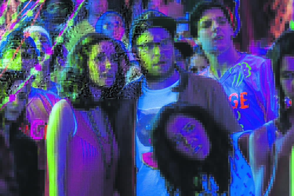 Rose Byrne, left, and Seth Rogen are former partyers confronting their waning coolness in “Neighbors.”