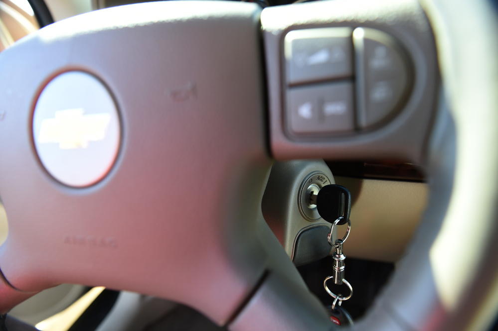 A key is inserted in the ignition of a 2005 Chevrolet Cobalt in Alexandria, Va. Owners of recalled GM vehicles across the nation are facing delays in getting ignition switches and other parts replaced.