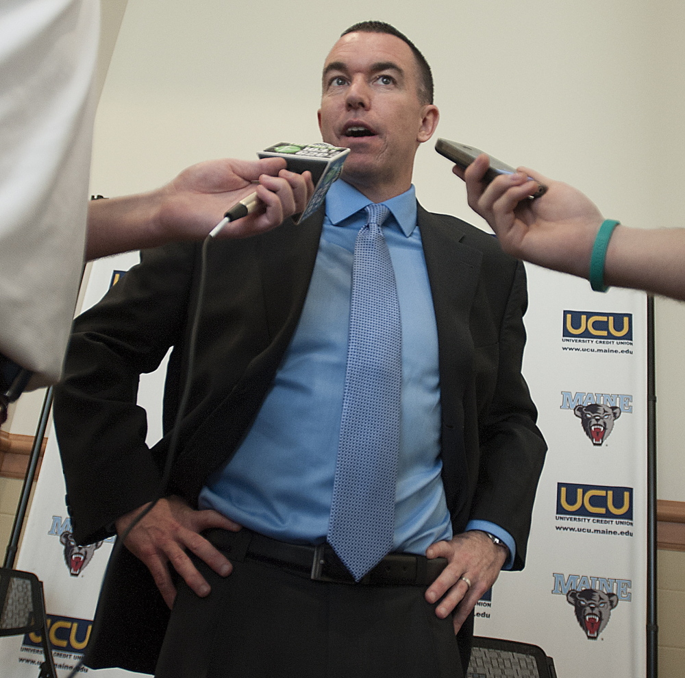 Bob Walsh looks dressed for success while being introduced at Bangor’s Cross Center as UMaine’s new men’s basketball coach, but turning around the woeful Black Bears will be no slam-dunk for the 42-year-old.