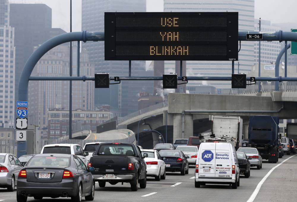 The message is clear on this electronic sign over Interstate 93 in Boston Friday.