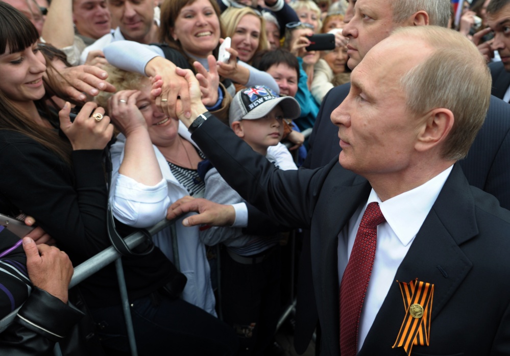 Russian President Vladimir Putin is greeted at celebrations marking Victory Day – which commemorates the defeat of Nazi Germany – on Friday in Sevastopol, Crimea.