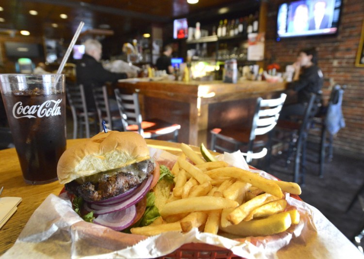 A classic cheeseburger with fries at Rosie’s Restaurant and Pub in Portland.