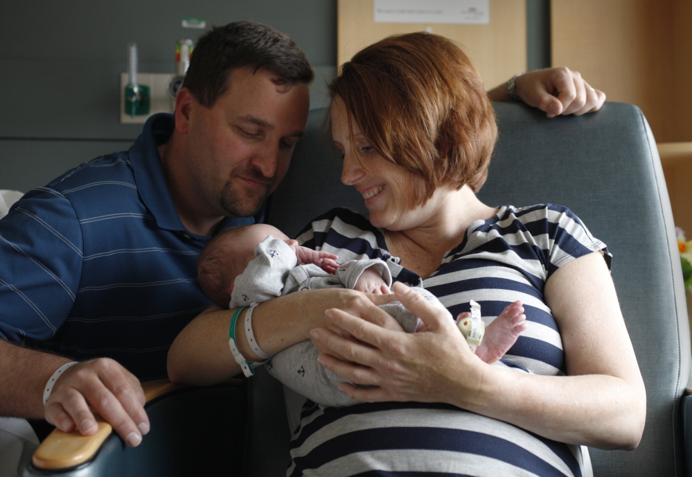 Aaron Thomas Gallivan, seen here with his parents Sean and Ondrea Gallivan, was born Wednesday, weighing 8 pounds, 6 ounces. The Gallivans married in 2010, when they were well into their 30s. They tried fertility treatments for a while, but Ondrea became pregnant during a time when they had paused the treatments.