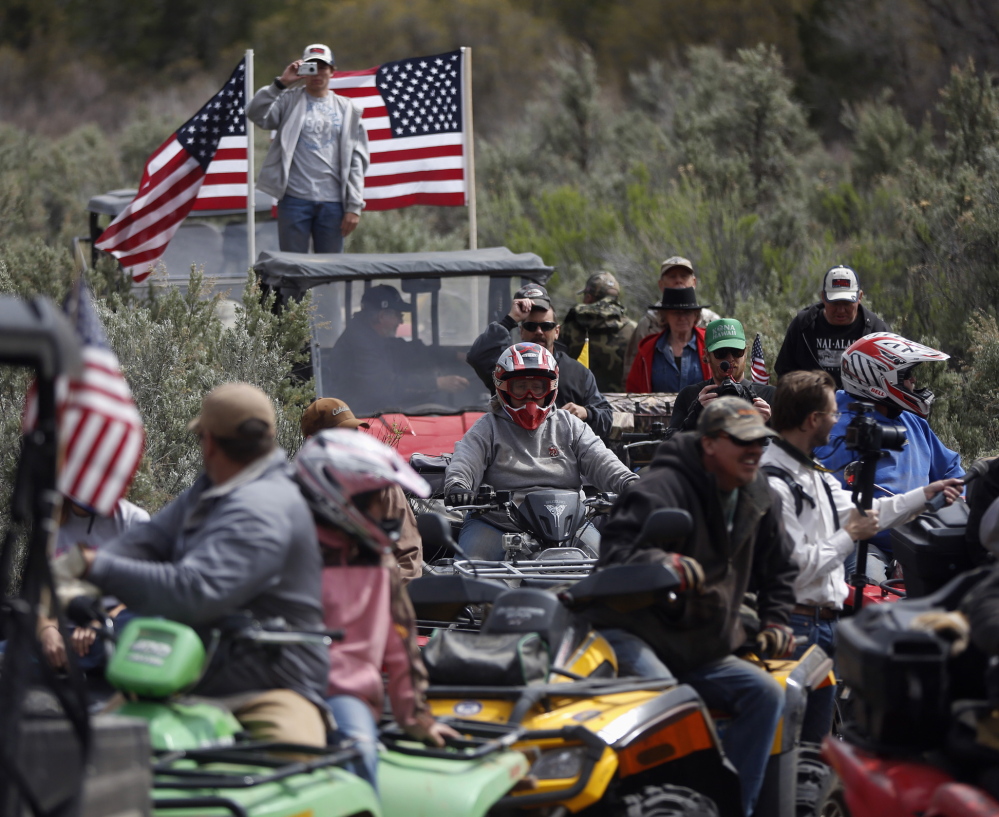 ATV riders arrive in Recapture Canyon outside Blanding, Utah, on Saturday to directly challenge federal control of protected lands in the American West.