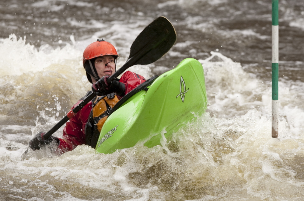 Belmont’s Scott Nelson makes a splash on Kenduskeag Stream’s whitewater slalom course, and the Maine Canoe and Kayak Racing Organization welcomes youngsters to do the same at its clinics.