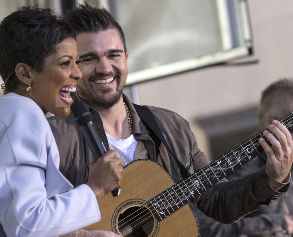 Co-anchor Tamron Hall on the “Today” set with the Colombian singer Juanes.