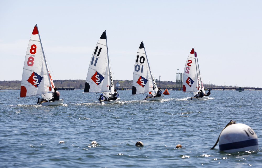 Sailors in 420-class boats compete Sunday in Portland Harbor in the B division of the Northern New England Regatta.