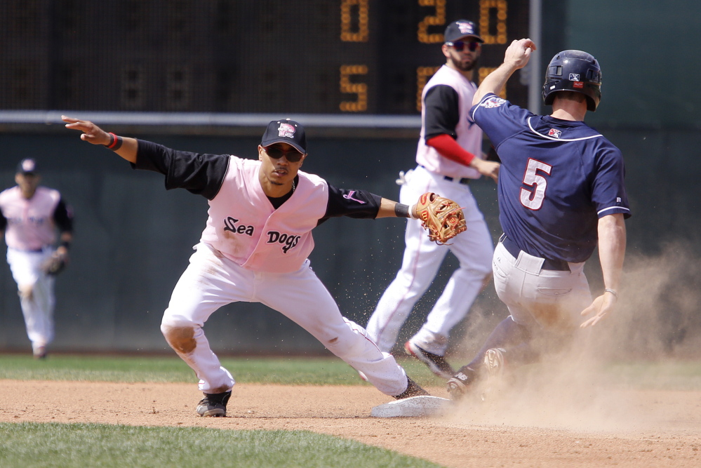 Portland’s Mookie Betts can’t make the tag as Manchester’s Jon Berti steals second base during the third inning of Sunday’s game at Hadlock Field.