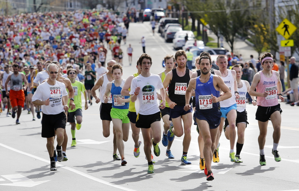 A two-time runner-up, Rob Gomez leads the pack early and maintains the advantage over a field of more than 2,400 finishers during the Portland Sea Dogs Mother’s Day 5K.