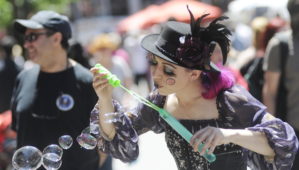 Miss Polly, an Old Port Festival street performer in 2012, and other characters will have three days to play this year as the annual party kicks off June 6 and runs through June 8.