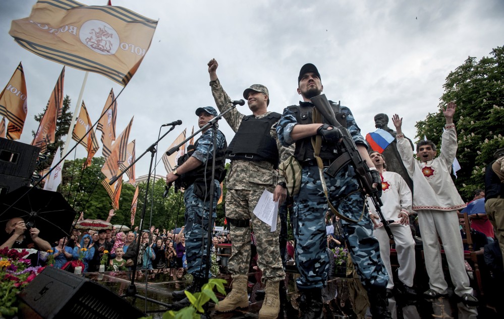 Pro-Russian gunmen and activists declare independence for the Luhansk region in eastern Ukraine on Monday. Leaders said they proposed to join with Donetsk to form a new republic.